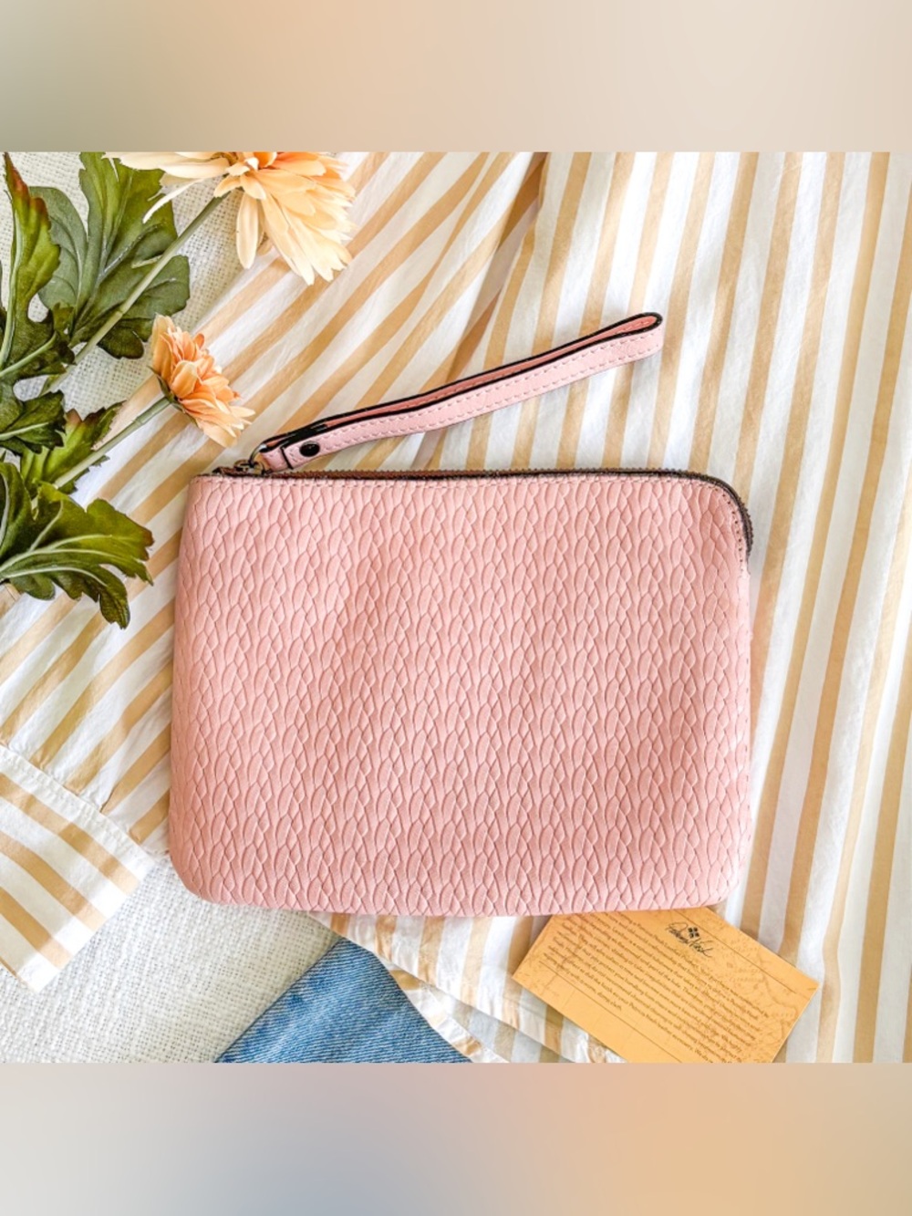 Patricia Nash woven leather wristlet.